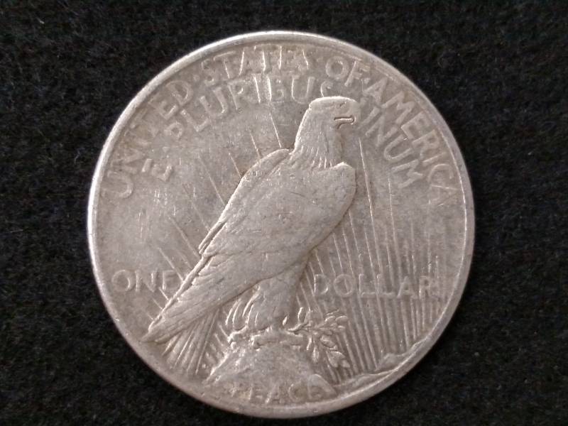 lot 66 image: 1925 Peace Silver Dollar...