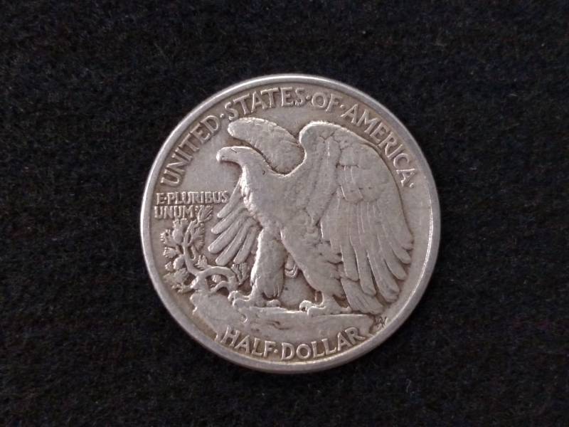 lot 111 image: 1942 Walking Liberty Silver Half Do...
