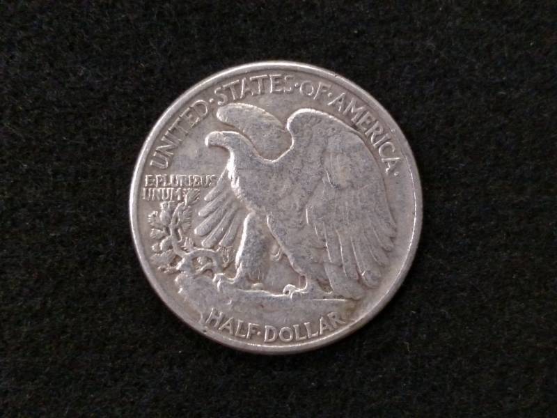 lot 119 image: 1946 Walking Liberty Silver Half Do...