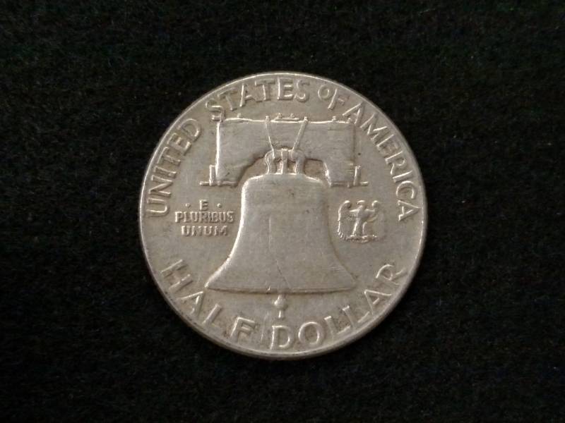 lot 125 image: 1949 Franklin Silver Half Dollar...