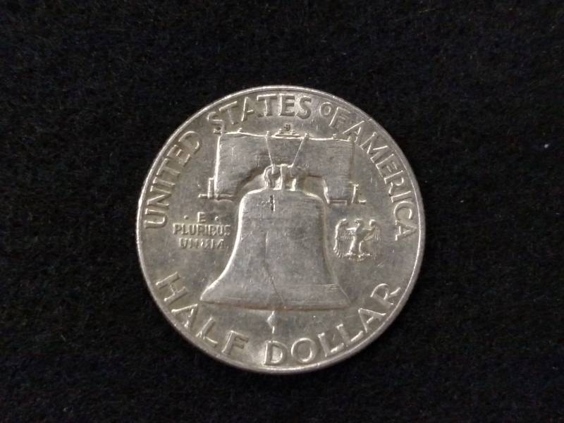 lot 131 image: 1951 S Franklin Silver Half Dollar...