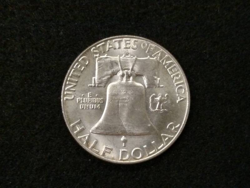 lot 150 image: 1963 D AU Franklin Silver Half Dol...