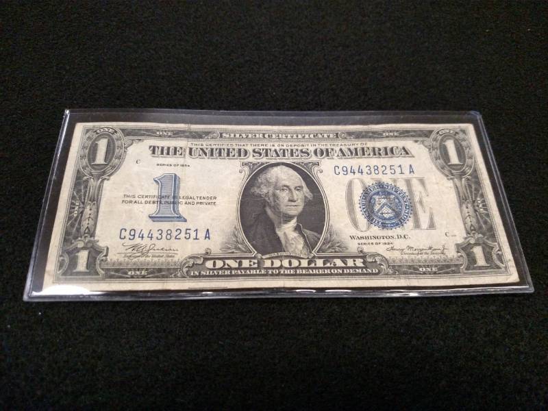 lot 183 image: 1934 Funny Back One Dollar Silver C...