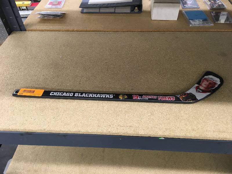 lot 563 image: Jonathan Toews Mini Hockey Stick