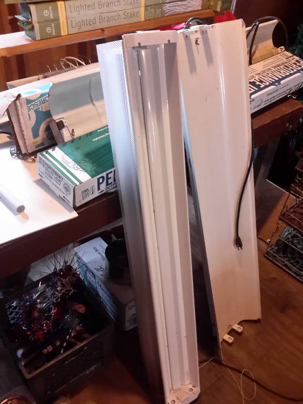 lot 83 image: Lot of fluorescent light fixtures and bulbs.. T8 and larger tubes