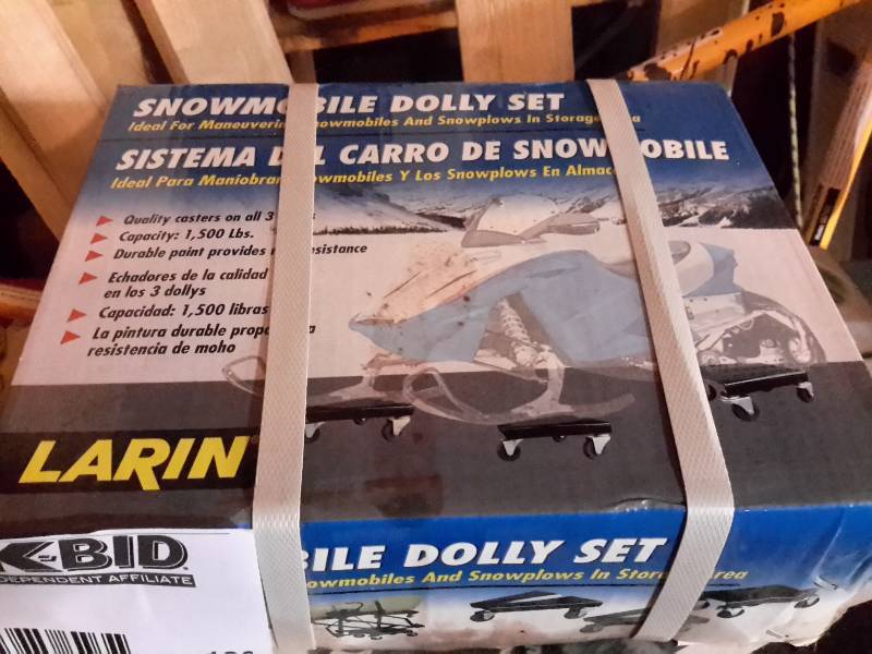 lot 130 image: Set of Snowmobile Dollies.. Looks like 3 in the package.. Not opened