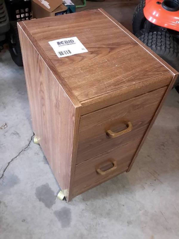 lot 32 image: small two drawer, simulated wood file cabinet.. Letter size