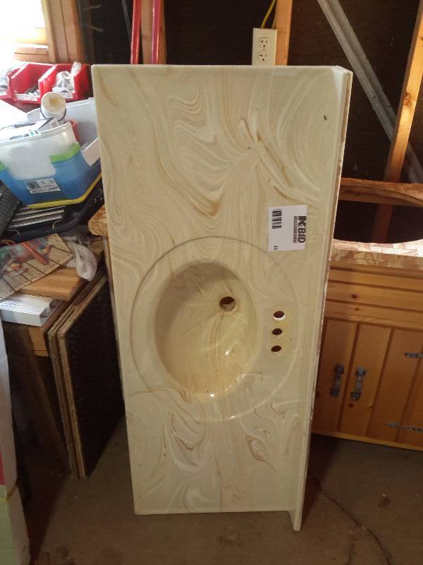 lot 33 image: Bathroom vanity counter top.  Hard Simulated stone.
