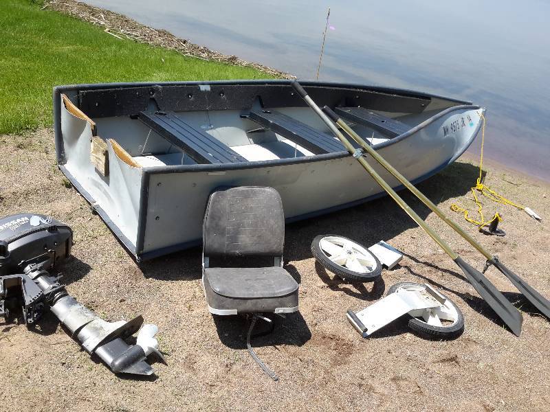 lot 1 image: 2003 Porta-Bote, Folding Boat and   Nissan 4 Stroke Outboard motor