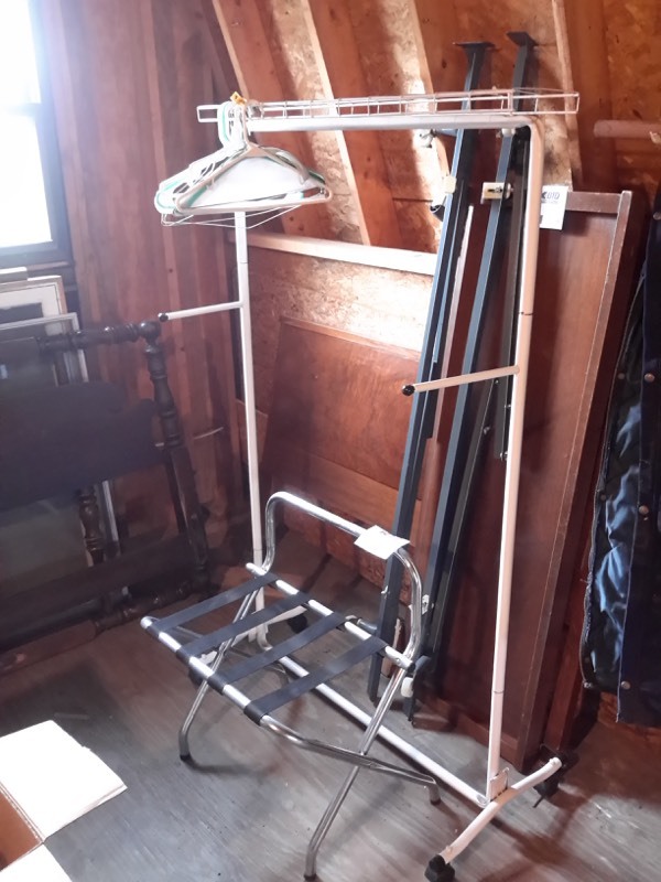 lot 75 image: Rolling hanging rack and chrome luggage rack