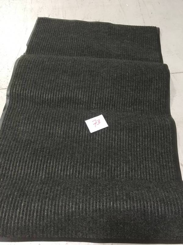 lot 73 image: TrafficMASTER Tri-Rib Charcoal 36 in. x 48 in. Polyester Door Mat SEE PICS DAMAGE