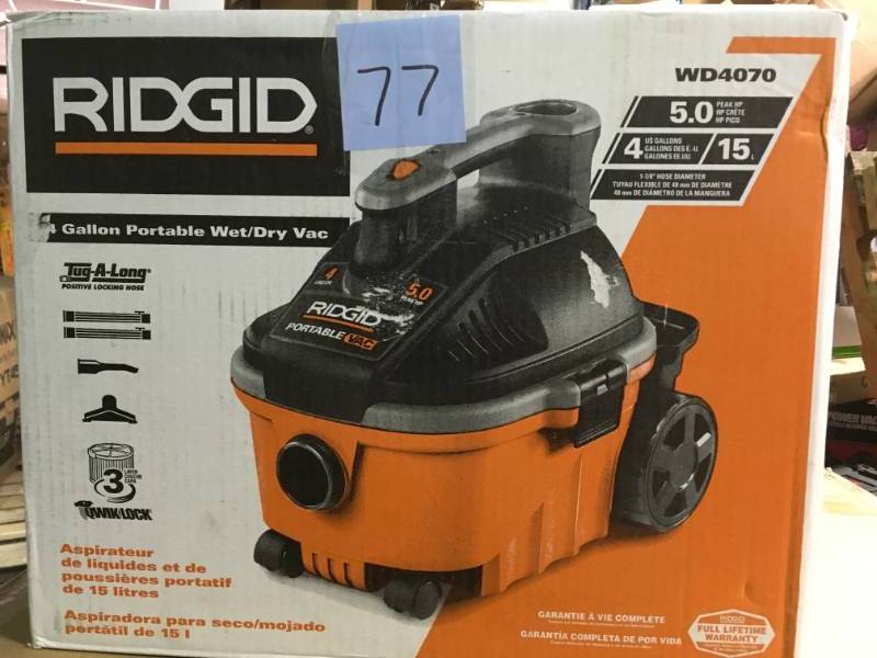 lot 77 image: RIDGID 4 Gal. 5.0-Peak HP Portable WetDry Vacuum USED