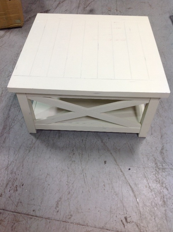 lot 110 image: Seaside Lodge Hand Rubbed White Coffee Table by Home Styles in good conditions