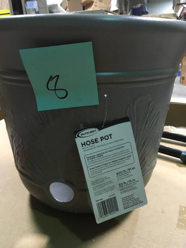 lot 8 image: 100 ft. Resin Hose Pot in good condition