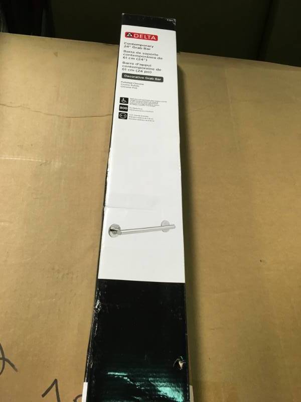 lot 39 image: Delta Contemporary 24 in. x 1-14 in. Concealed Screw ADA-Compliant Decorative Grab Bar in Chrome in good condition