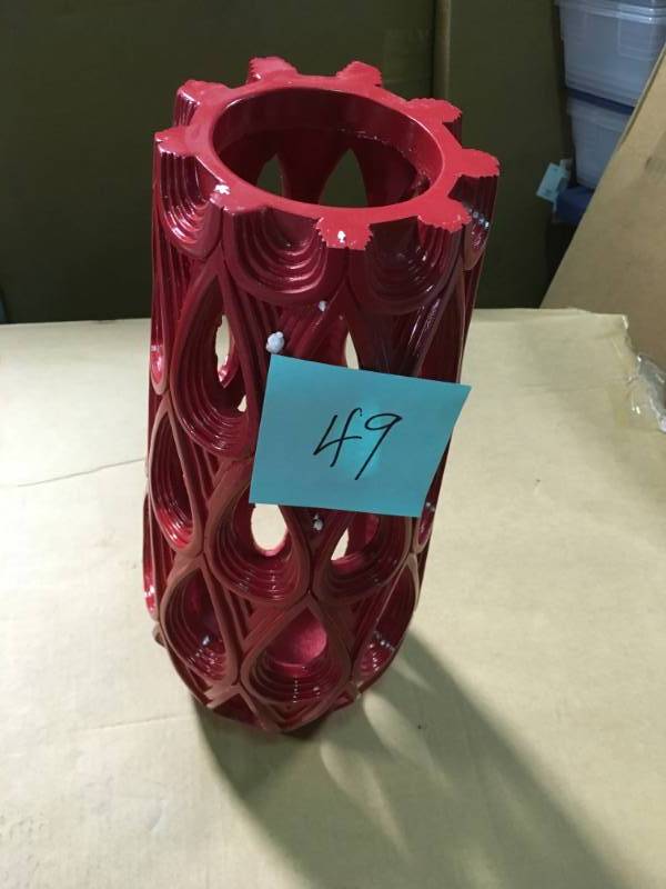 lot 49 image: Decorative Deep Red Resin Pierced Vase by THREE HANDS in good condition