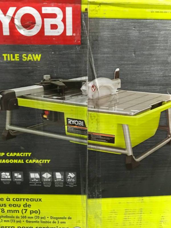 lot 58 image: RYOBI 7 in. 4.8 Amp Tabletop Tile Saw in good condition