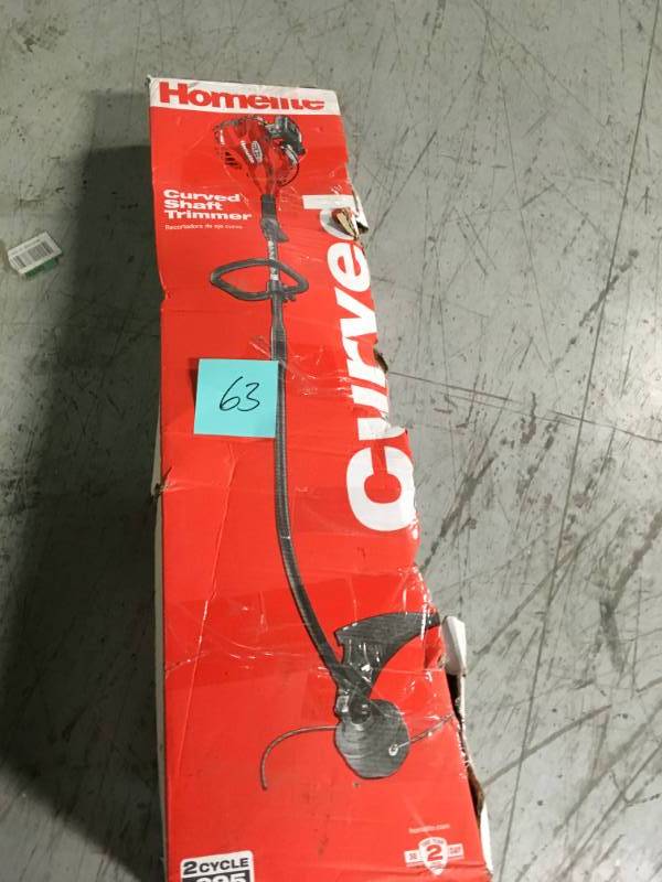 lot 63 image: Homelite 2-Cycle 26 CC Curved Shaft Gas Trimmer in good condition