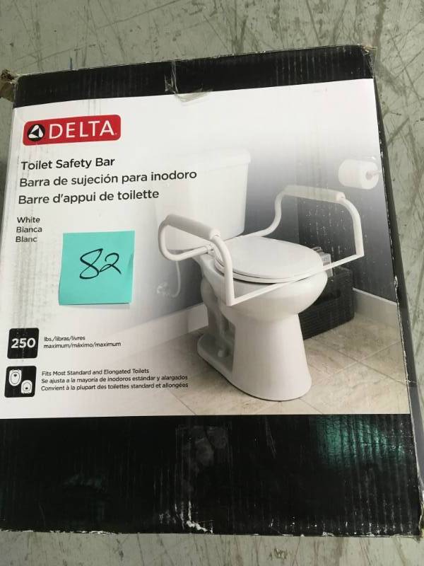 lot 82 image: Delta 9.1 in. Toilet Safety Bar not used