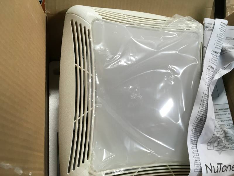 NuTone 70 CFM Ceiling Bathroom Exhaust Fan with Light, White Grille and Light in good condition