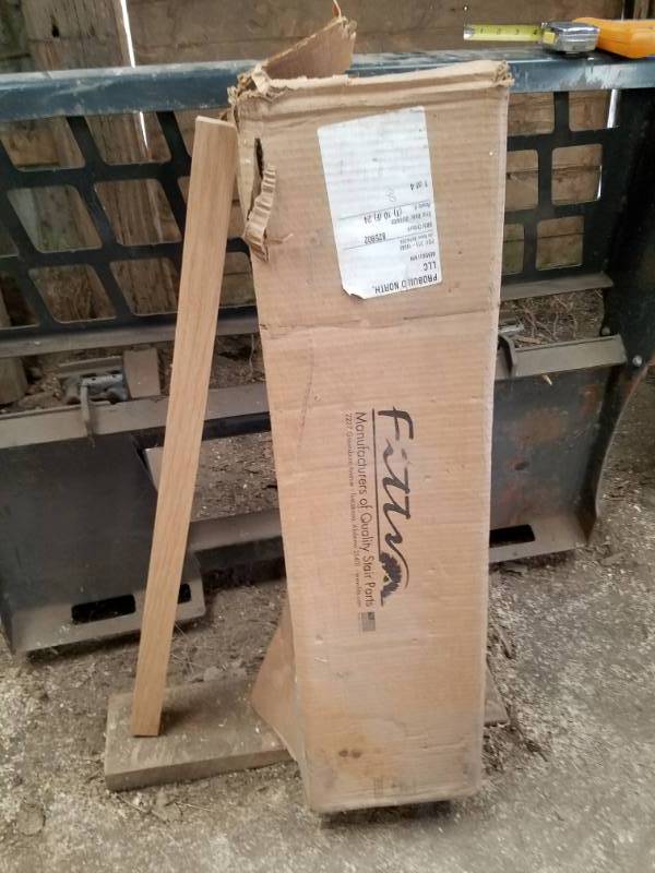 lot 56 image: Box of 25 Solid Oak Stair Case