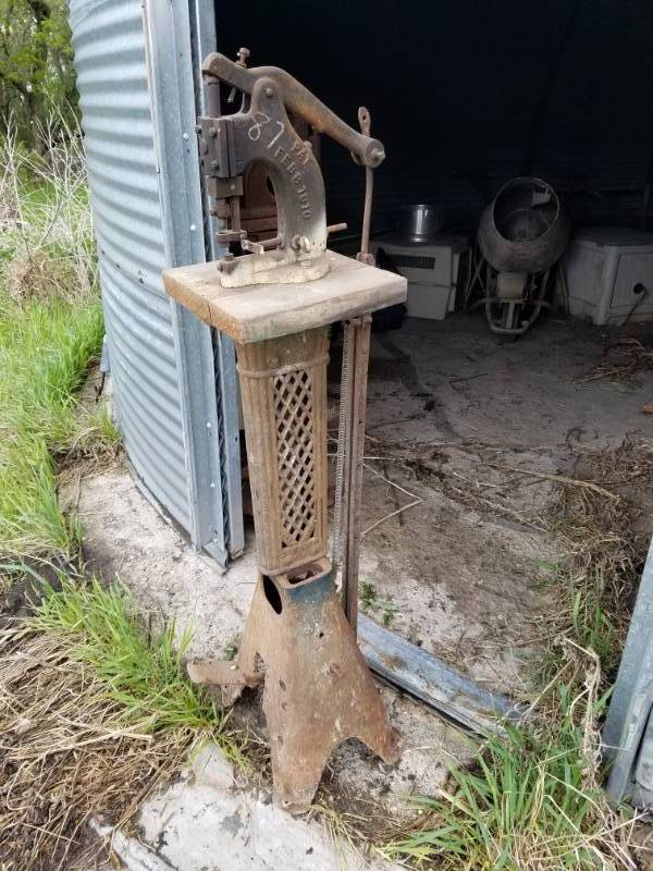 lot 145 image: Vintage foot operated stud setter or button machine on stand