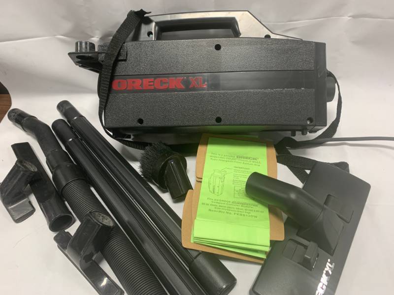 lot 59 image: Oreck XL Vacuum Cleaner with Attachments