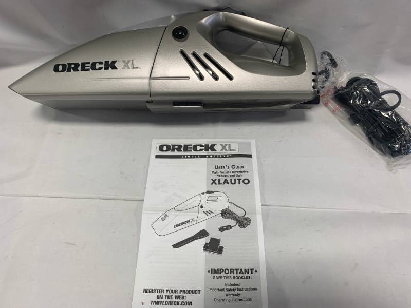 lot 73 image: New Oreck XL Vacuum