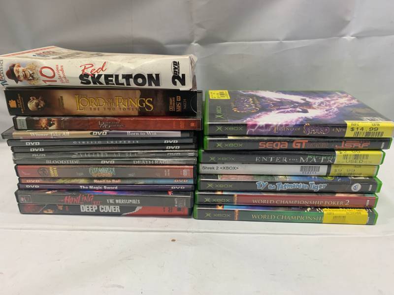 lot 75 image: Lot of 7 Xbox Games, DVDs & VHS Lot