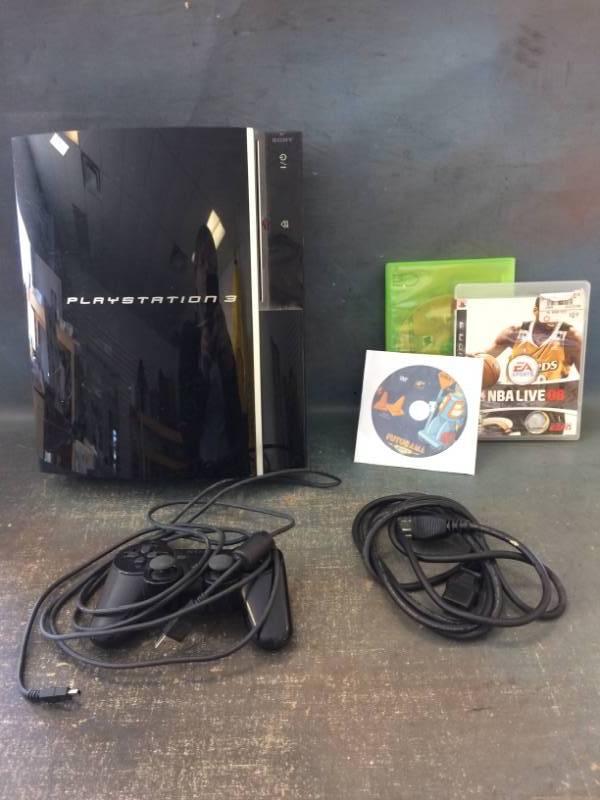 lot 24 image: Sony Playstation 3 with Games