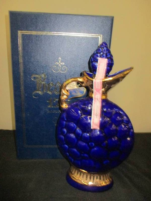 lot 58 image: Decanter Old and Unique Must be 21 to buy and pickup