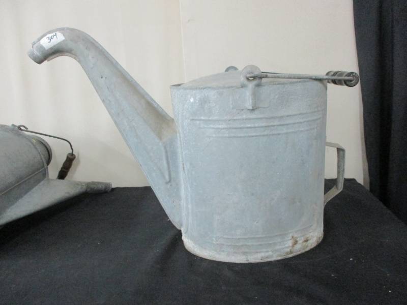 lot 137 image: Antique Galvanized Watering Can with Wood Handle Nice Condition