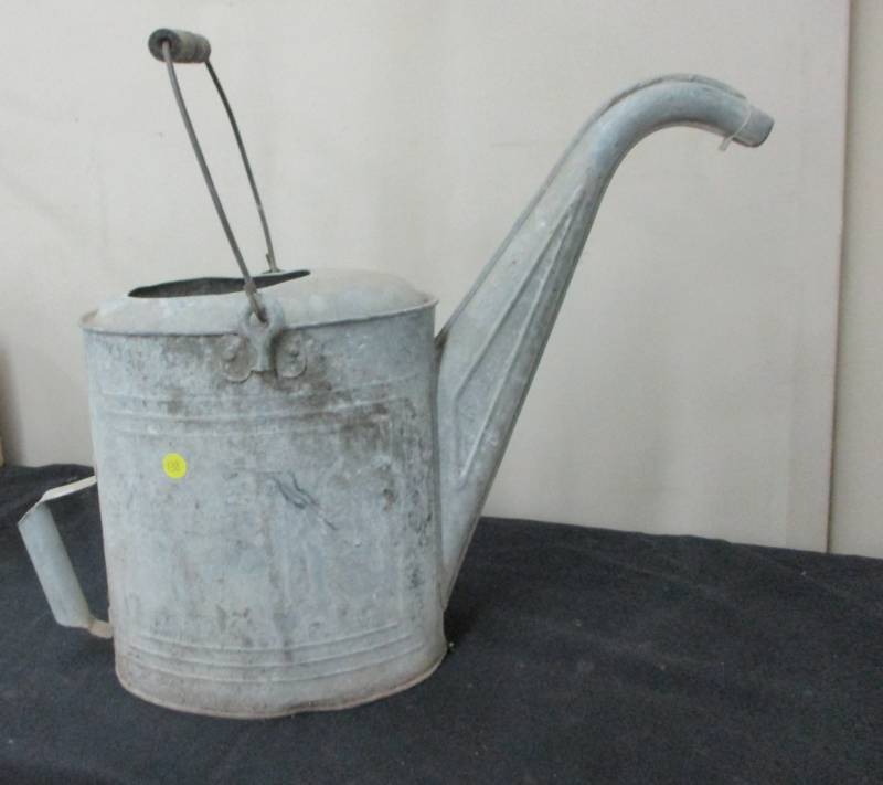 lot 138 image: Antique Galvanized Watering Can with Wood Handle Nice Condition
