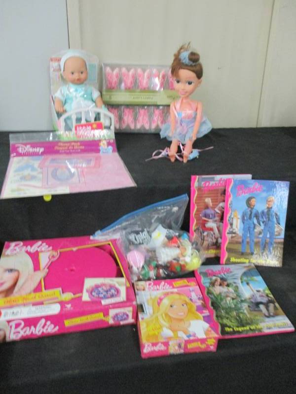 lot 154 image: Balarina lights, dolls, ballarina doll, barbie book and princess paper