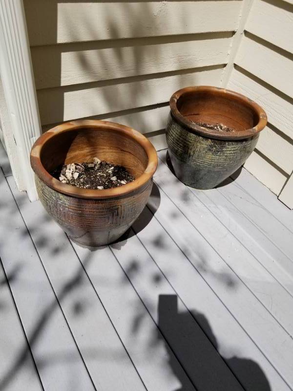 lot 20 image: Pair of Polished Planters