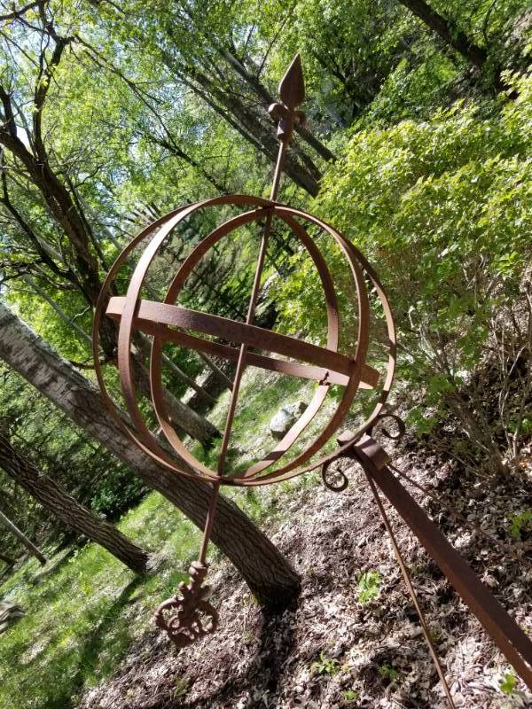 lot 35 image: Iron Sphere Garden Decor