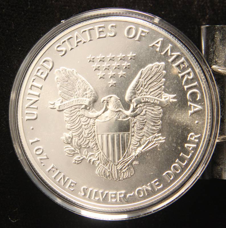1987 AMERICAN SILVER EAGLE 1 TROY OZ. .999 FINE SILVER IN AIRTITE