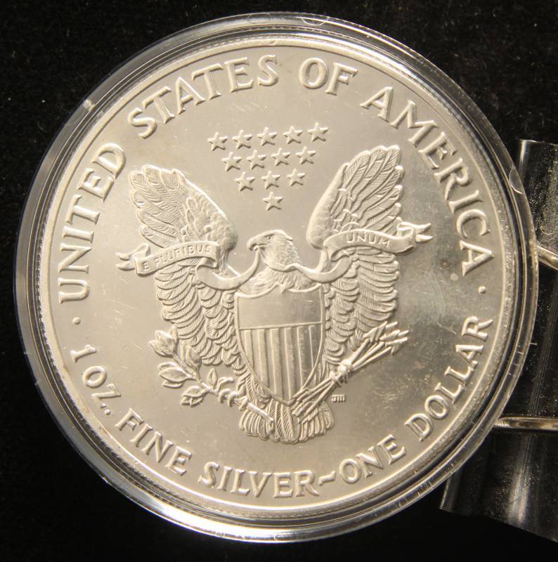 1990 AMERICAN SILVER EAGLE 1 TROY OZ. .999 FINE SILVER IN AIRTITE