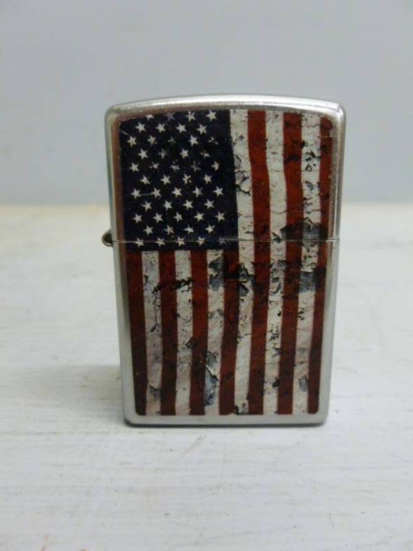 lot 57 image: Zippo Lighter