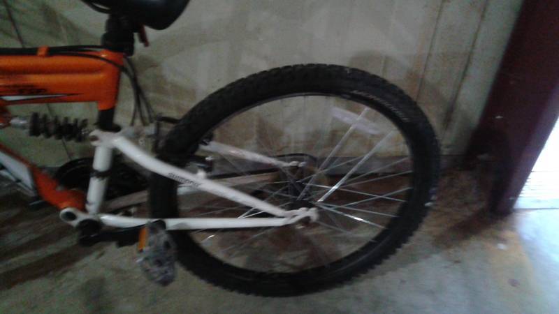 lot 9 image: Mongoose Bicycle, Rim May Be Bent, May Need Some Maintenance, Has Some Extra Rims With It