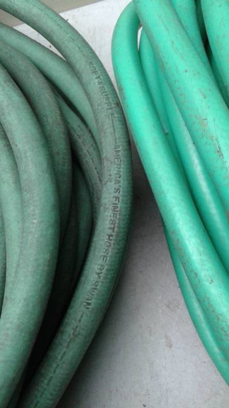 lot 39 image: Two Garden Hoses