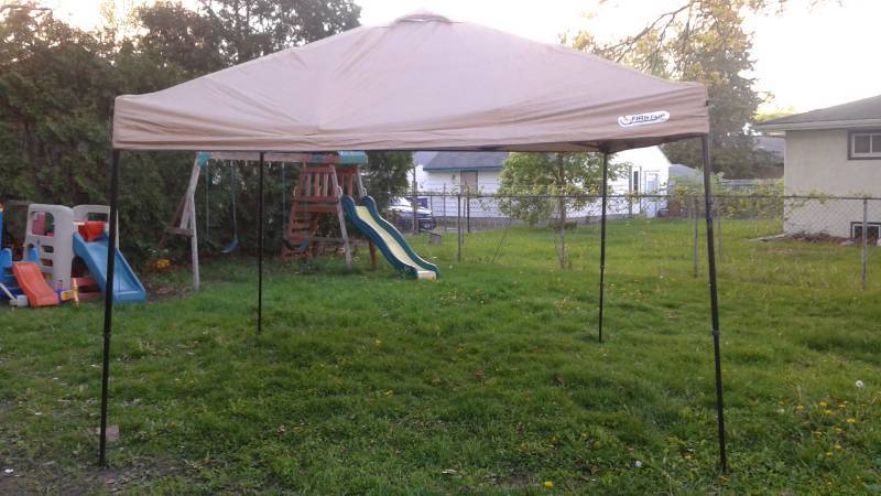 lot 16 image: 10 x 10 Folding Canopy Cover, Has A Broken Bar On It, Still Works