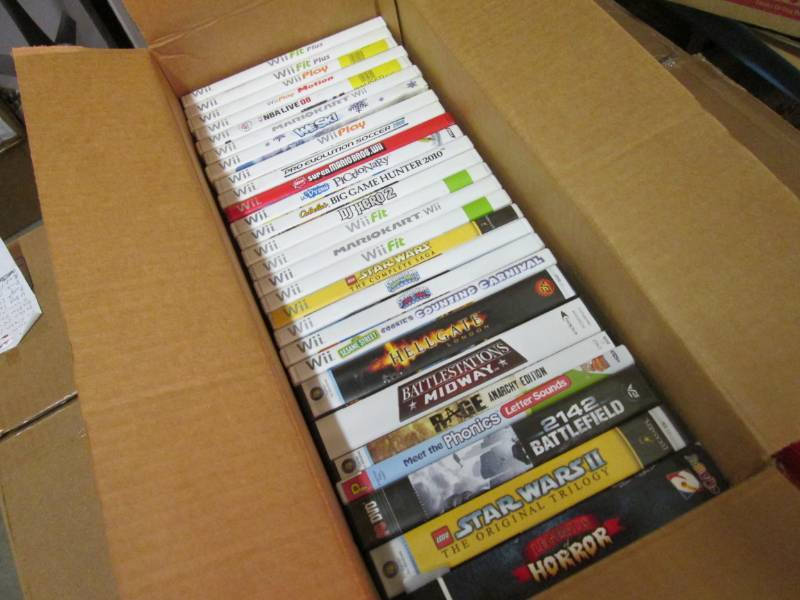 lot 57 image: Lot of Wii Games and other Misc  RM...