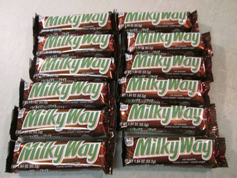 lot 83 image: 12 Milky Way Candy Bars Best by Apr...