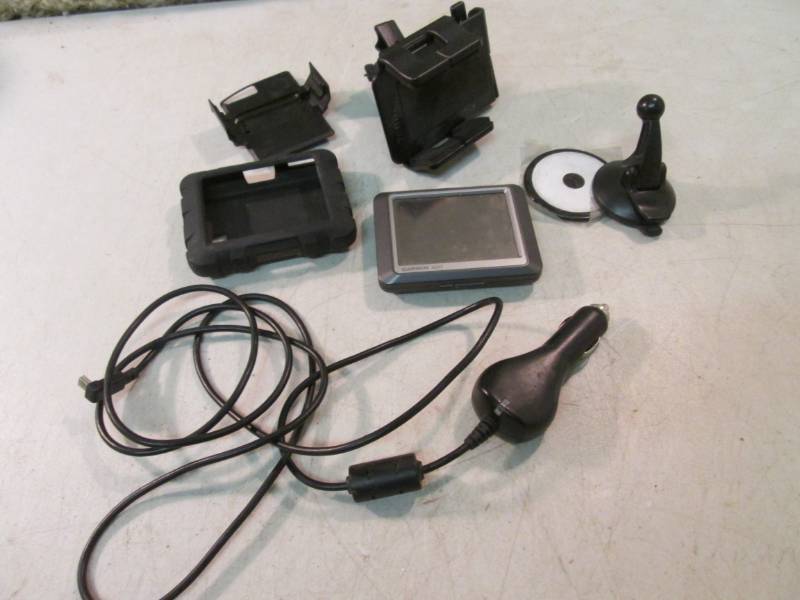 lot 189 image: Garmin nuvi GPS with Accessories 3....