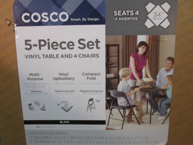 lot 1 image: Cosco 5-Piece Vinyl Table and 4 Cha...