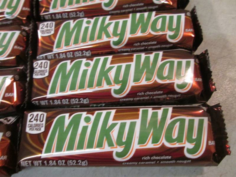 lot 101 image: 12 Milky Way Candy Bars Best by Apr...