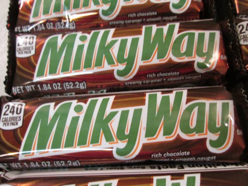 lot 102 image: 12 Milky Way Candy Bars Best by Apr...