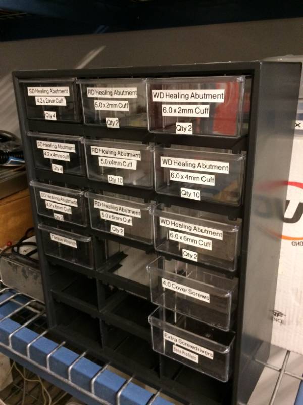 lot 41 image: Medical Multi Drawer Supply Organizer With Assorted Dental Abutments
