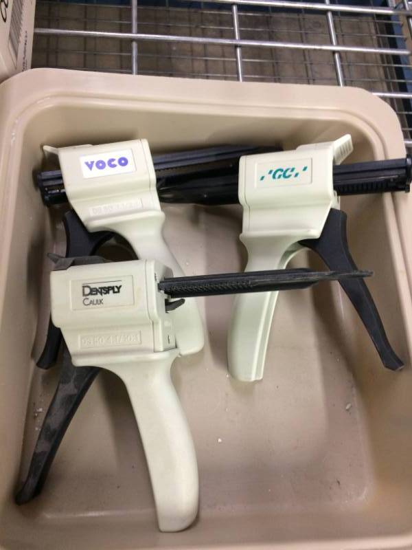 lot 53 image: Lot Of 4 Impression Mixing Guns Dispensers Dental 